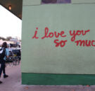 A person walks by the "I love you so much"sign in Austin, Texas.