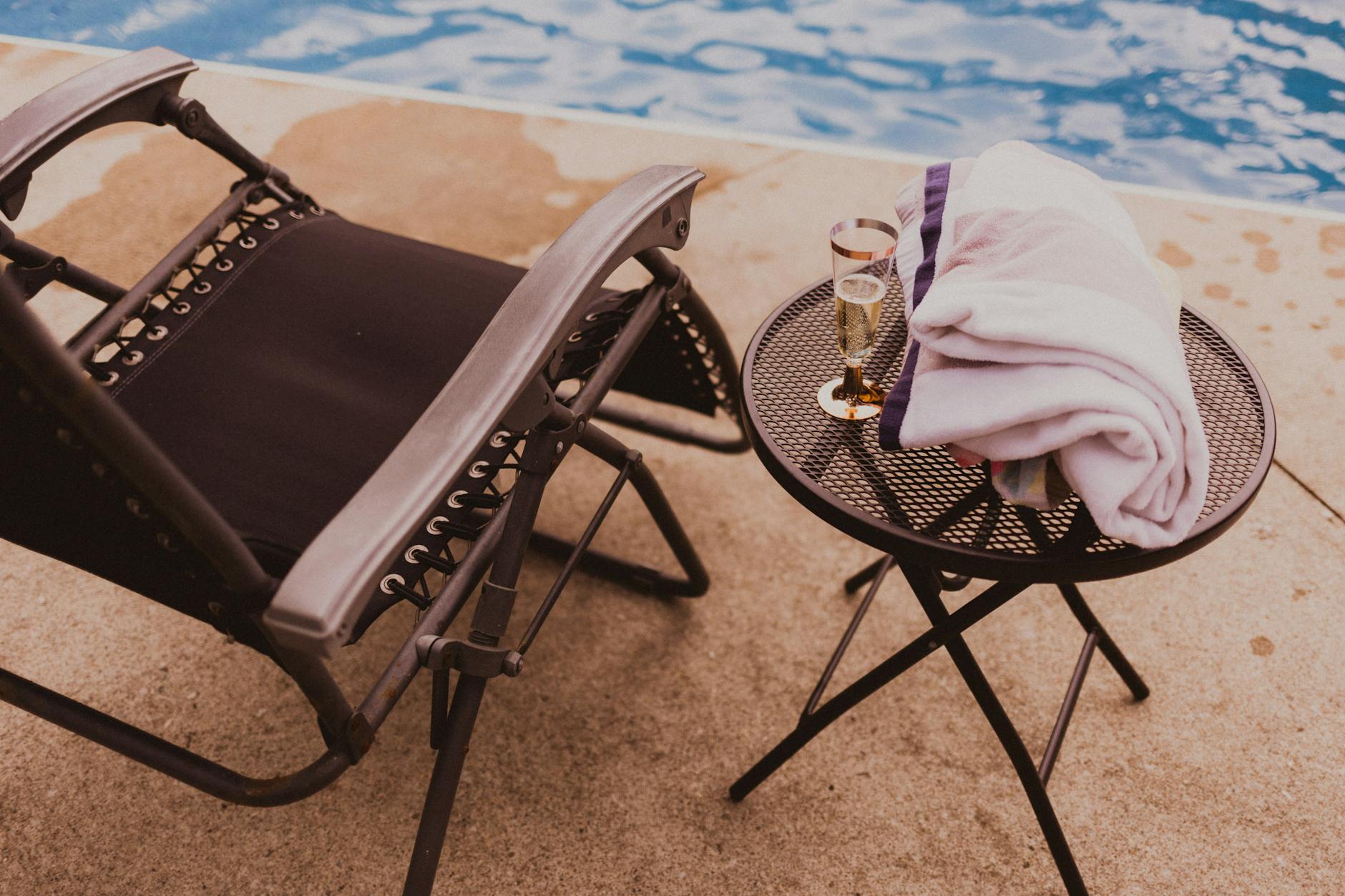 lounging zone with champagne in poolside