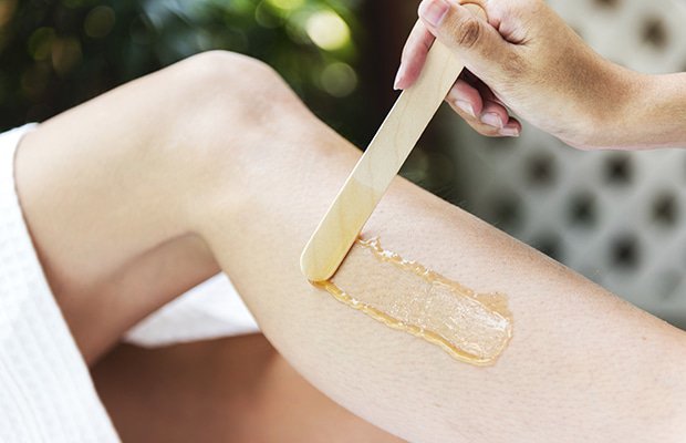 Before you book your next waxing appointment, consider this: There’s a natural, less painful (!), healthier alternative that’s popping up all over—sugaring.