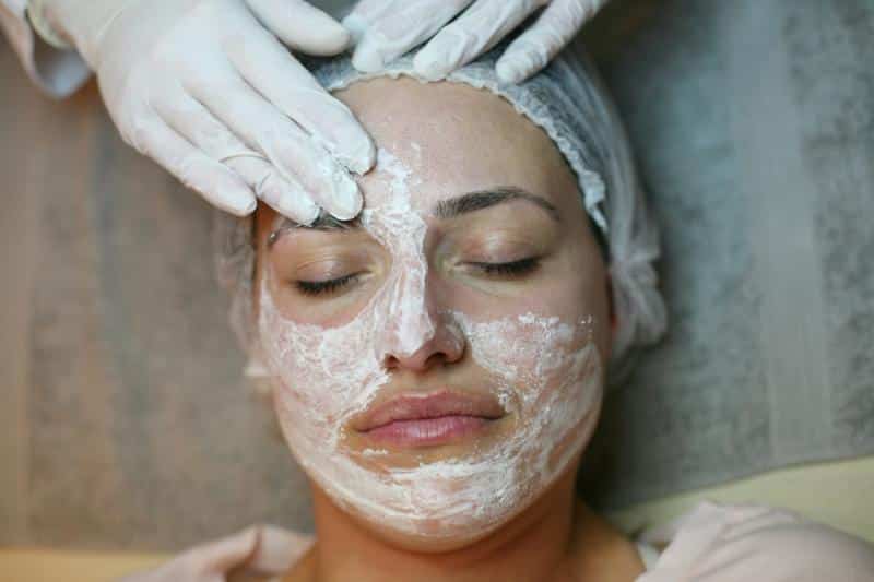 woman getting a face mask